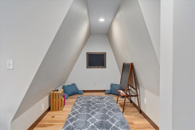 1704 156th St, Erin Prairie Twp, WI 54017 - playroom featuring light wood finished floors, lofted ceiling, and recessed lighting