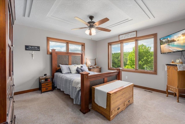 1704 156th St, Erin Prairie Twp, WI 54017 - bedroom with light colored carpet, multiple windows, a textured ceiling, and ceiling fan
