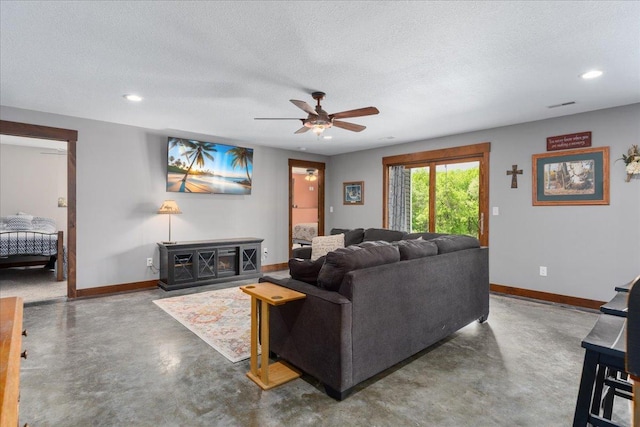 1704 156th St, Erin Prairie Twp, WI 54017 - living area with finished concrete flooring, a textured ceiling, ceiling fan, and recessed lighting