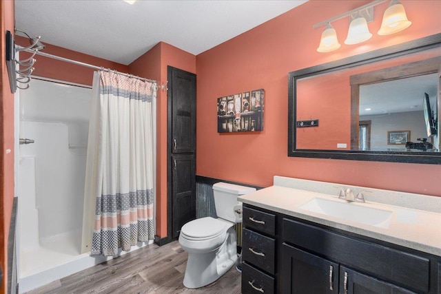 1704 156th St, Erin Prairie Twp, WI 54017 - full bathroom featuring wood finished floors, a shower stall, and vanity