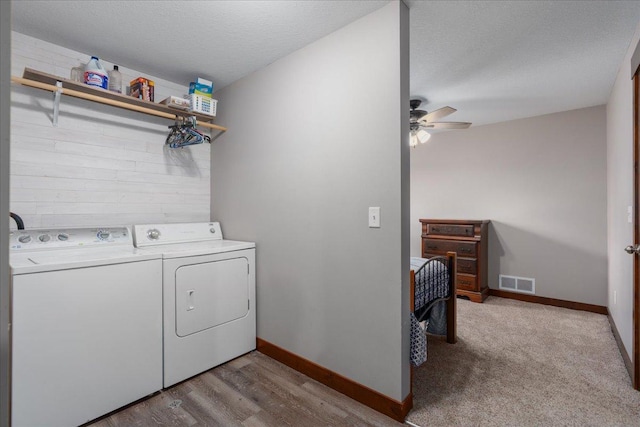 1704 156th St, Erin Prairie Twp, WI 54017 - laundry room featuring washing machine and dryer, ceiling fan, and wood finished floors