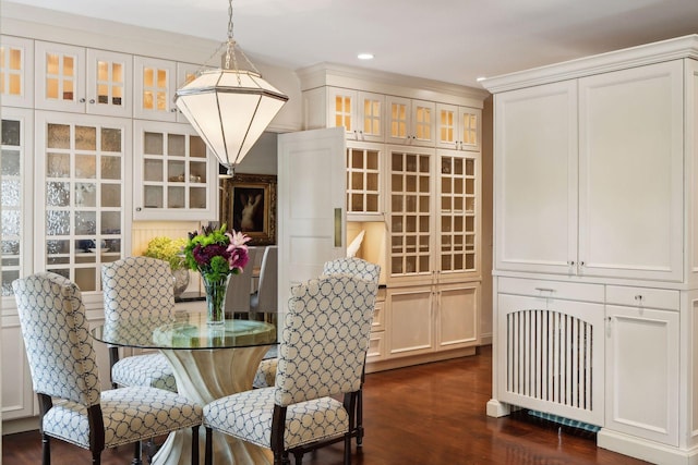 dining room featuring dark wood-style flooring and recessed lighting
