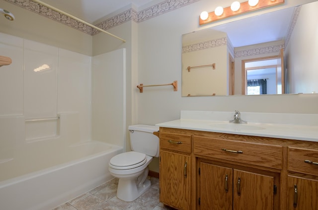 bathroom featuring toilet, vanity, and tub / shower combination