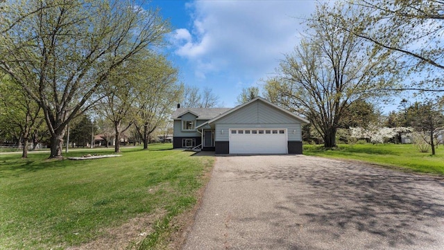 2070 Prospect Dr NE, Saint Cloud, MN 56304 - view of front facade featuring an attached garage, asphalt driveway, a front lawn, and a chimney