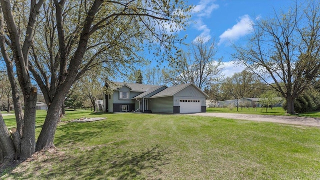 2070 Prospect Dr NE, Saint Cloud, MN 56304 - view of front of home with driveway, a garage, and a front lawn