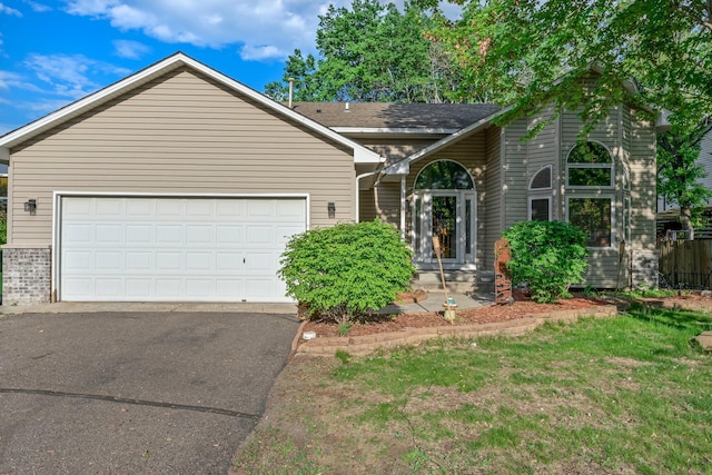 13367 Martin St NW, Andover, MN 55304 - ranch-style home featuring driveway, an attached garage, and a front lawn