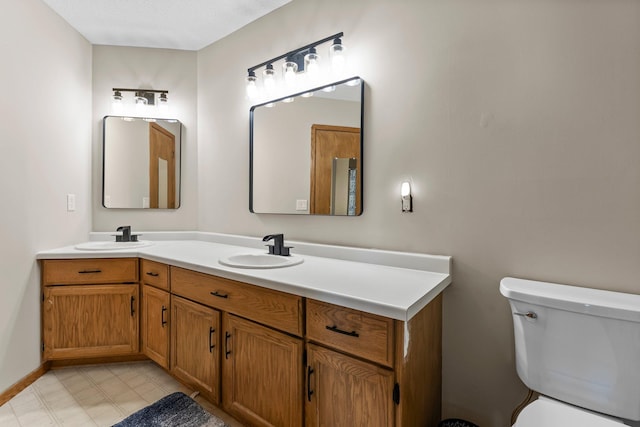13367 Martin St NW, Andover, MN 55304 - bathroom featuring toilet and double vanity