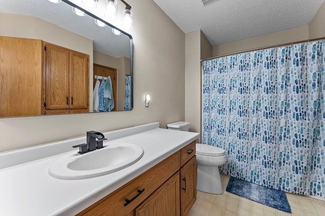 13367 Martin St NW, Andover, MN 55304 - bathroom featuring toilet, vanity, a textured ceiling, a shower with shower curtain, and tile patterned floors
