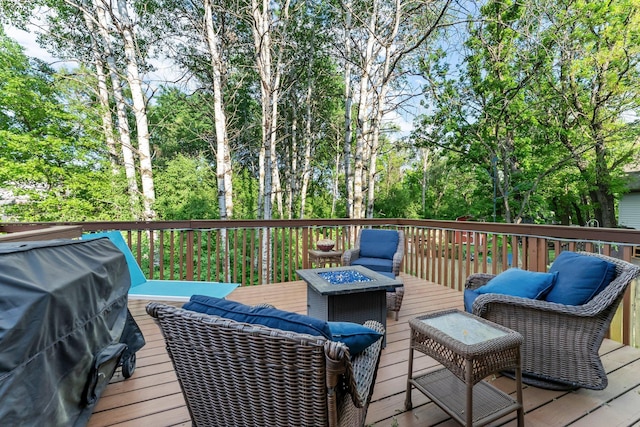 13367 Martin St NW, Andover, MN 55304 - wooden terrace featuring an outdoor living space with a fire pit