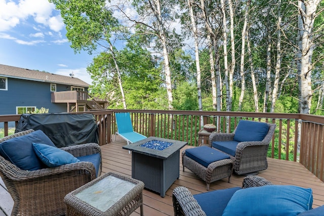 13367 Martin St NW, Andover, MN 55304 - wooden terrace featuring an outdoor fire pit and grilling area