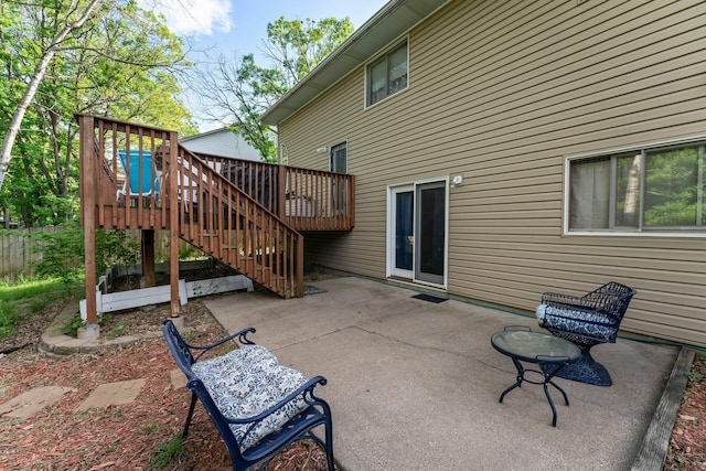 13367 Martin St NW, Andover, MN 55304 - view of patio featuring a wooden deck and stairway