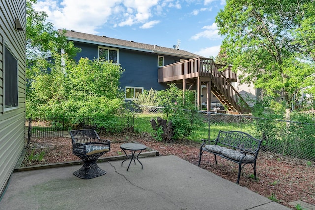 13367 Martin St NW, Andover, MN 55304 - view of patio with a fenced backyard, a wooden deck, and stairway