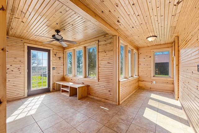 3020 320th St E, Sciota Twp, MN 55057 - unfurnished sunroom featuring wood ceiling, wood walls, and tile patterned floors
