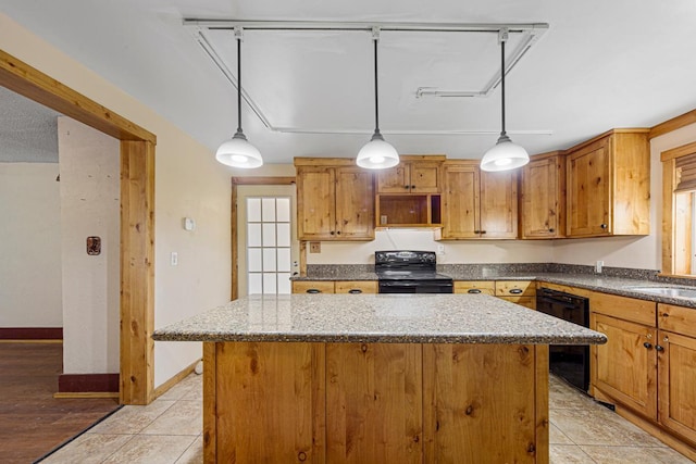 3020 320th St E, Sciota Twp, MN 55057 - kitchen with black appliances, a kitchen island, dark stone countertops, decorative light fixtures, and light tile patterned floors