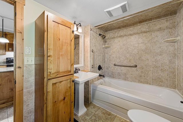 3020 320th St E, Sciota Twp, MN 55057 - full bathroom featuring bathtub / shower combination, tile patterned flooring, and toilet