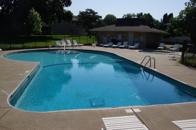 2140 Tamarin Trl, Golden Valley, MN 55427 - community pool featuring a patio