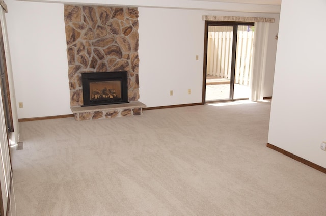 2140 Tamarin Trl, Golden Valley, MN 55427 - unfurnished living room with baseboards, a fireplace, and carpet flooring