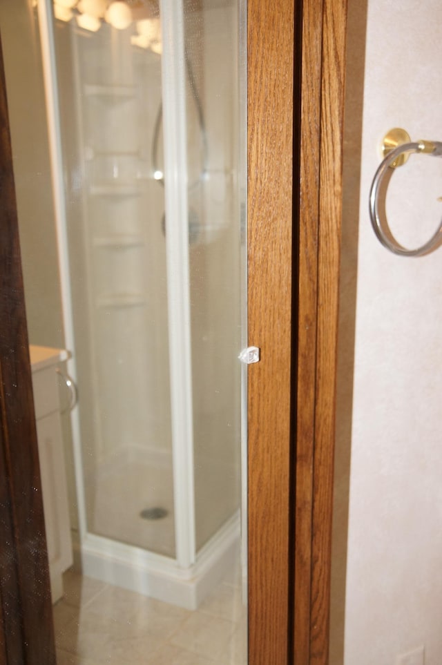 2140 Tamarin Trl, Golden Valley, MN 55427 - bathroom with a shower stall and tile patterned floors