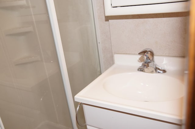 2140 Tamarin Trl, Golden Valley, MN 55427 - bathroom featuring a stall shower and a sink