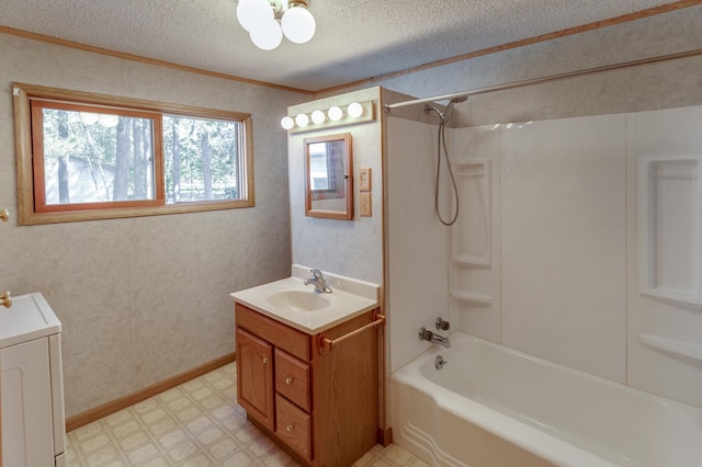 full bath with a textured ceiling, tile patterned floors, ornamental molding, washer / clothes dryer, and shower / washtub combination