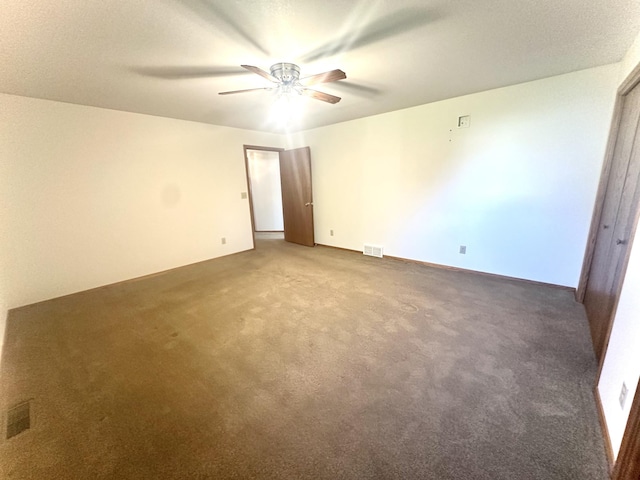 unfurnished bedroom with carpet flooring and ceiling fan