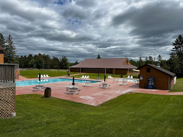 community pool featuring a patio area
