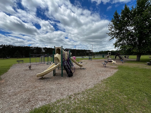 community play area featuring a yard