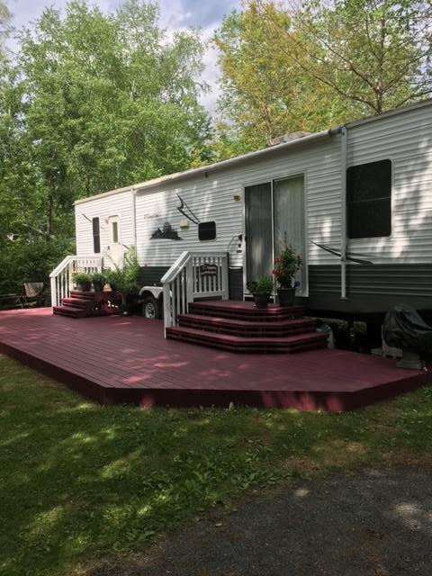rear view of house with a deck