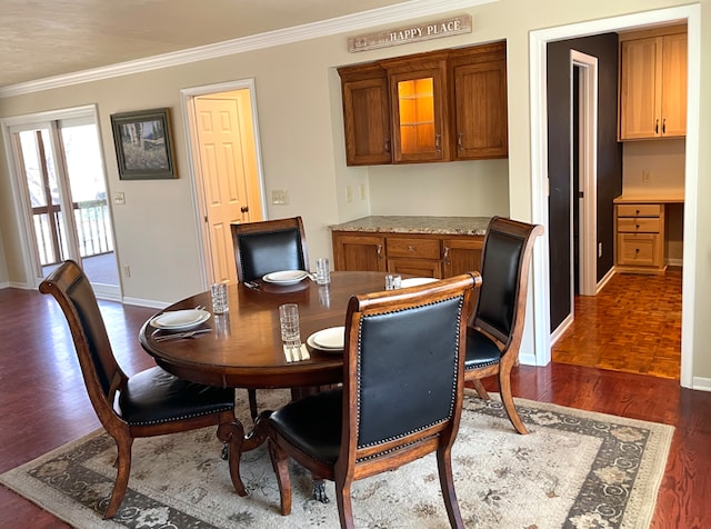 3918 Willmatt Hl, Minnetonka, MN 55305 - dining space with crown molding, dark wood finished floors, and baseboards