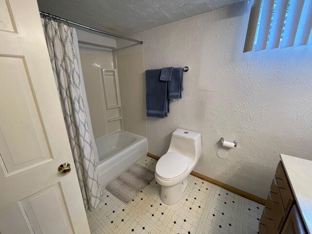 3918 Willmatt Hl, Minnetonka, MN 55305 - bathroom with baseboards, toilet, vanity, shower / bathtub combination with curtain, and a textured ceiling