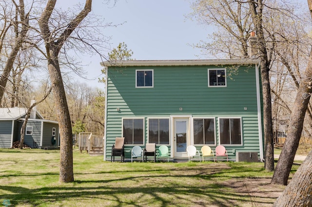 20850 Leona Beach Rd, Erie Twp, MN 56578 - rear view of property with a yard