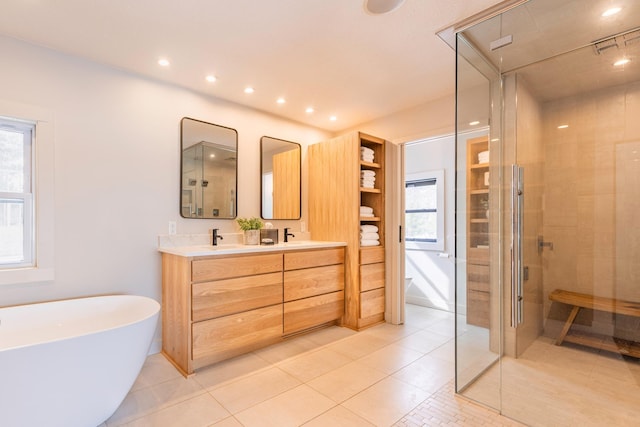 20380 Crystal Springs Loop, Harris Twp, MN 55744 - full bath featuring a stall shower, tile patterned floors, double vanity, a soaking tub, and recessed lighting