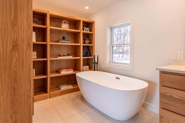 20380 Crystal Springs Loop, Harris Twp, MN 55744 - bathroom with a soaking tub, vanity, and tile patterned floors