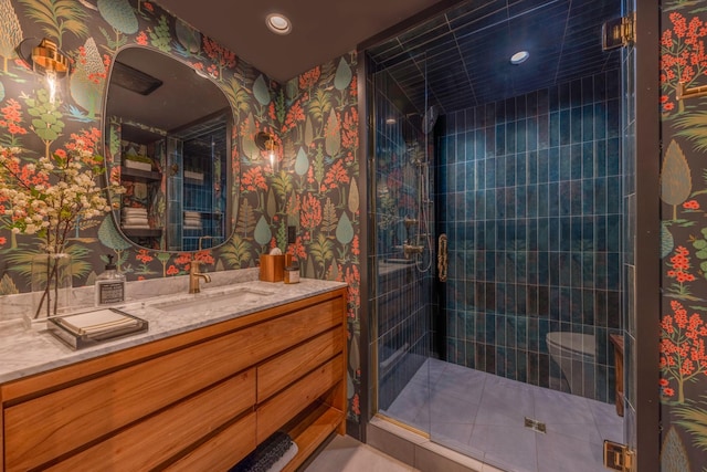 20380 Crystal Springs Loop, Harris Twp, MN 55744 - bathroom featuring wallpapered walls, vanity, a stall shower, and recessed lighting