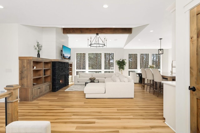 15359 Quamba St NE, Ham Lake, MN 55304 - living room featuring light wood finished floors, recessed lighting, healthy amount of natural light, a chandelier, and beam ceiling
