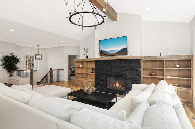 15359 Quamba St NE, Ham Lake, MN 55304 - living room with a chandelier, wood finished floors, recessed lighting, and a fireplace