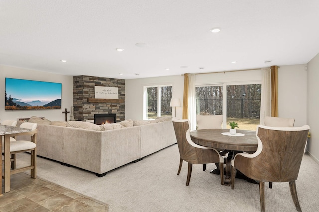 15359 Quamba St NE, Ham Lake, MN 55304 - living area featuring a stone fireplace and recessed lighting