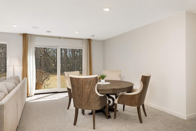 15359 Quamba St NE, Ham Lake, MN 55304 - dining space featuring light colored carpet, recessed lighting, and baseboards