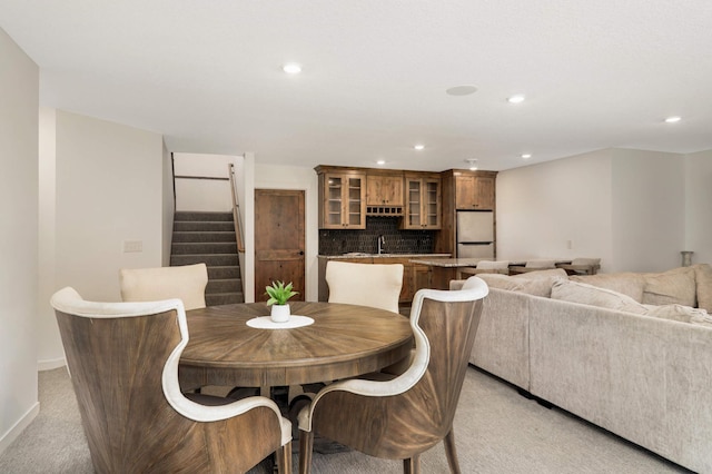 15359 Quamba St NE, Ham Lake, MN 55304 - dining space with wet bar, light colored carpet, recessed lighting, stairway, and baseboards