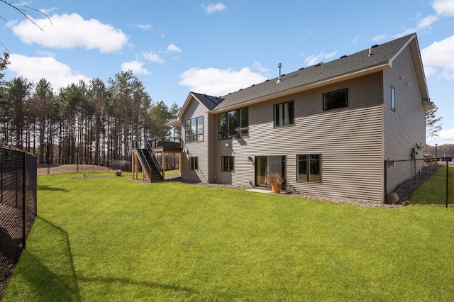 15359 Quamba St NE, Ham Lake, MN 55304 - back of house featuring stairs and a wooden deck