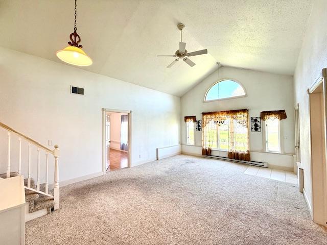 421 Main St E, Eitzen, MN 55931 - carpeted spare room with ceiling fan, high vaulted ceiling, a baseboard heating unit, and stairway
