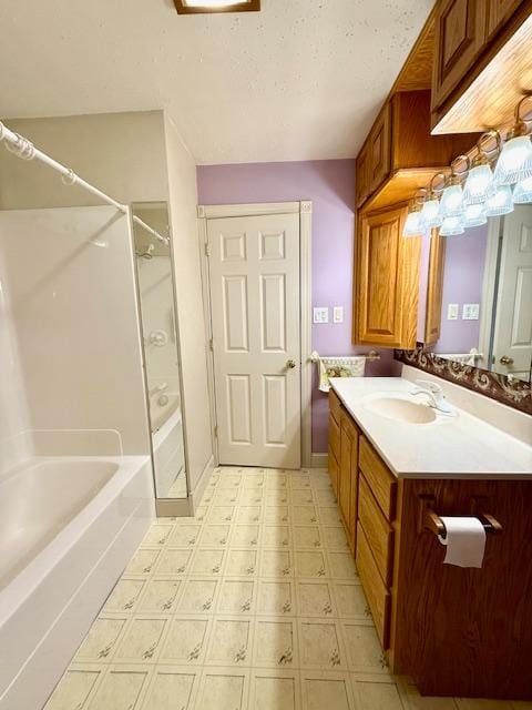 421 Main St E, Eitzen, MN 55931 - full bath featuring shower / bath combination, vanity, and tile patterned floors