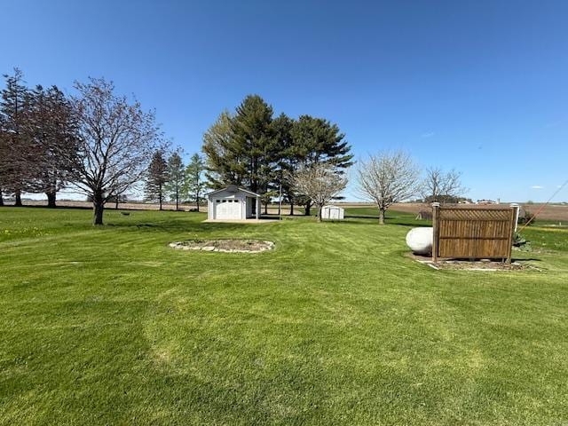 421 Main St E, Eitzen, MN 55931 - view of green lawn with an outdoor structure