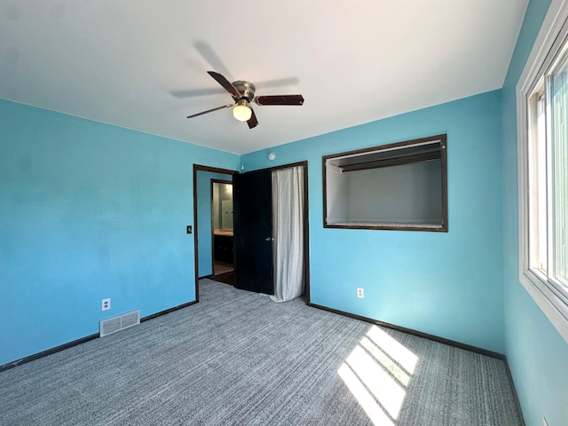 4806 Monroe St NE, Columbia Heights, MN 55421 - unfurnished bedroom featuring carpet flooring, baseboards, and ceiling fan