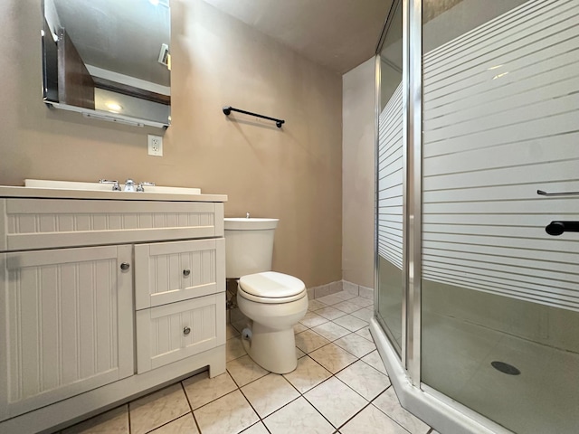 4806 Monroe St NE, Columbia Heights, MN 55421 - bathroom featuring tile patterned floors, a shower stall, toilet, and vanity