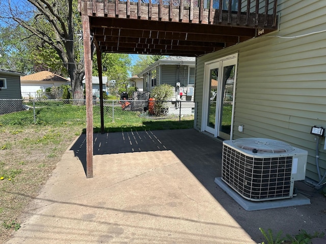 4806 Monroe St NE, Columbia Heights, MN 55421 - view of patio / terrace featuring central air condition unit and fence