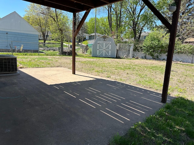 4806 Monroe St NE, Columbia Heights, MN 55421 - view of patio featuring a shed, cooling unit, and an outdoor structure