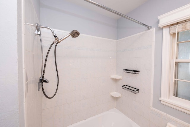 bathroom with shower / bath combination