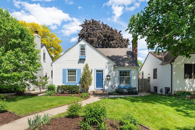 5341 Knox Ave S, Minneapolis, MN 55419 - bungalow-style home with a front lawn, a chimney, and roof with shingles