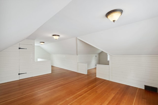5341 Knox Ave S, Minneapolis, MN 55419 - bonus room with wood-type flooring, lofted ceiling, and wooden walls